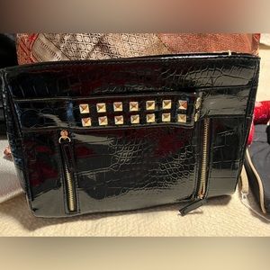 Rihanna black faux croc clutch bag or cosmetic bag with studs pink lining